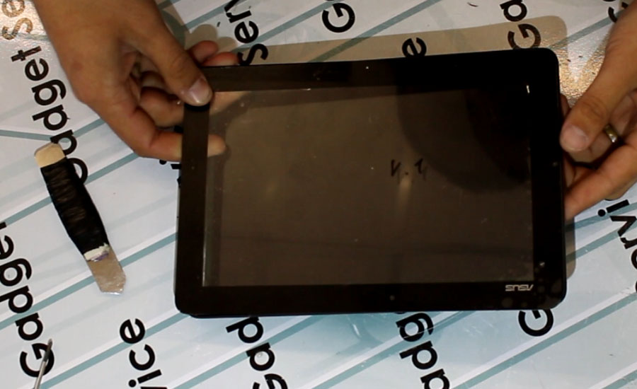 замена сенсорного стекла экрана Asus TF103 в Минске